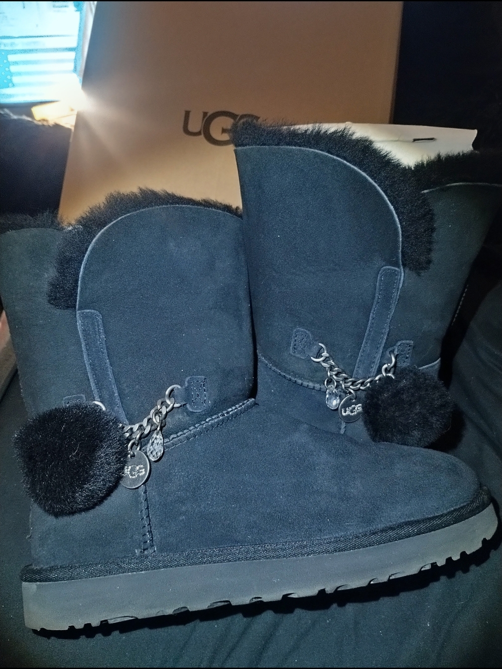 UGG Classic Mini Pom Pom Sheepskin Boots in Black